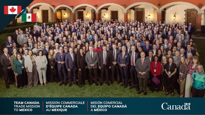 Team Canada delegation posing in Mexico